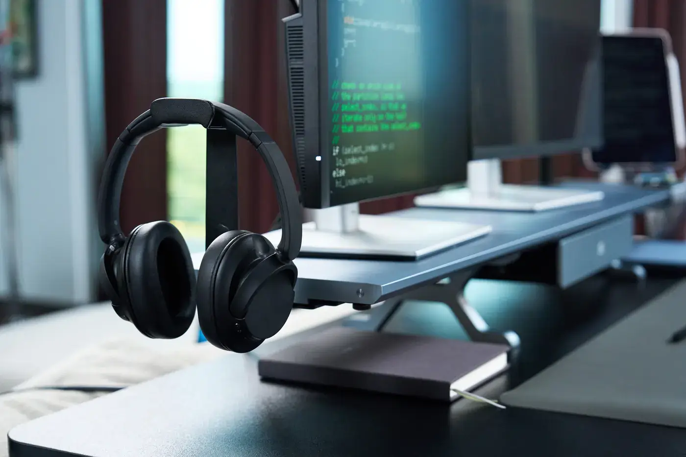 Headphones resting on the Plank